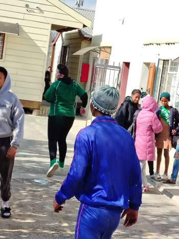 May be an image of 6 people, activewear and street